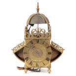 WILLIAM SPEAKMAN IN HATTON GARDEN FECIT A LATE 17TH CENTURY WINGED BRASS LANTERN CLOCK WITH ALARM