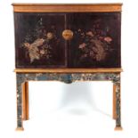 A 19TH CENTURY CHINOISERIE STYLE LACQUERED CABINET ON STAND the moulded cornice with blind fret