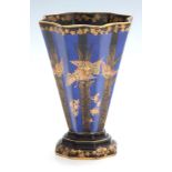 A CROWN DEVON FIELDINGS FLARED FOOTED VASE of octagonal panelled form, royal blue and black ground