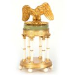 A FINE 19TH CENTURY GILT BRASS AND IVORY SET CENTREPIECE WITH ONYX COVER AND CAST WINGED EAGLE