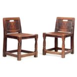 A GOOD PAIR OF EARLY ROBERT 'MOUSEMAN' THOMPSON JOINED OAK LOW PANEL BACK SIDE CHAIRS with