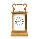 A LATE 19TH CENTURY FRENCH REPEATING CARRIAGE CLOCK the gilt brass moulded case enclosing a