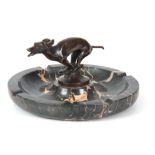 AN ART DECO PATINATED BRONZE AND MARBLE SCULPTURE modelled as a stylish running greyhound mounted on