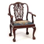 AN UNUSUAL MID 18TH CENTURY GENTLEMAN'S COLONIAL CARVED IRISH STYLE OPEN ARMCHAIR OF GENEROUS SIZE