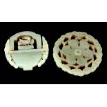 TWO CHINESE CARVED JADE PI DISCS one formed as a basket with hinged handle 50mm diameter, the