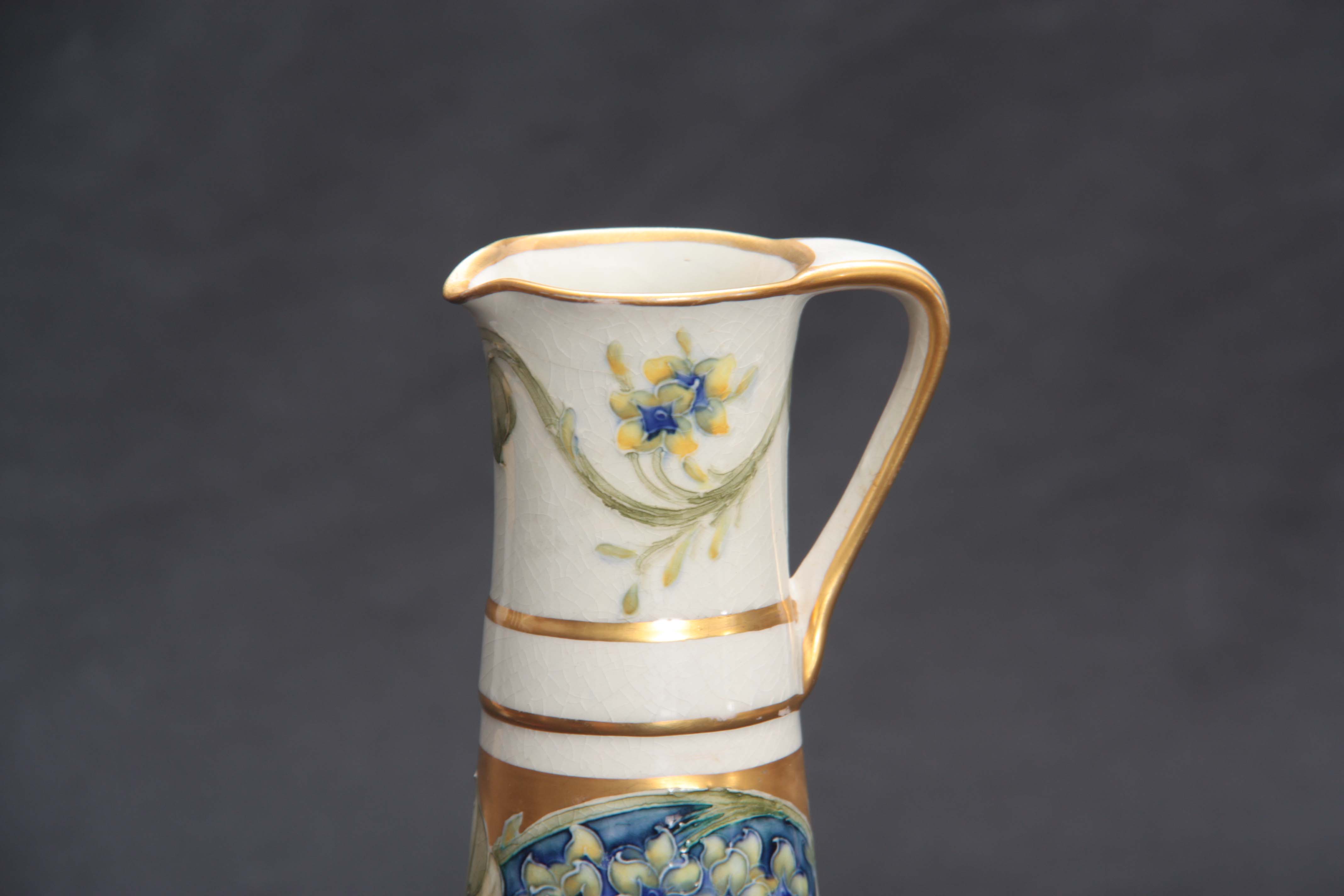 A JAS. MACINTYRE & Co. BURSLEM SLENDER TAPERING EWER with tube lined panelled flower spray - Image 2 of 5