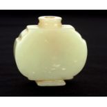 A QUING DYNASTY CHINESE PALE GREEN JADE SNUFF BOTTLE of plain form with stepped shoulders and