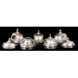 A SET OF FIVE GEORGE III GRADUATED OVAL SHAPED SILVER PLATED MEAT COVERS MADE FOR THE EARL OF