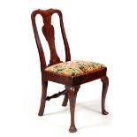 AN EARLY 18TH CENTURY ELM SIDE CHAIR having vase-shaped back splat and 18thCentury tapestry seat