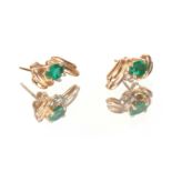 A PAIR OF LADIES 14CT GOLD EMERALD AND DIAMOND EARRINGS each set with oval cut stones and two