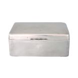 A GEORGE V PLAIN RECTANGULAR SILVER CIGARETTE BOX with hinged lid and divided cedar lining 13.5cm