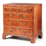 A GEORGE I FIGURED WALNUT BACHELOR'S CHEST with caddy moulded top above a brushing slide and four