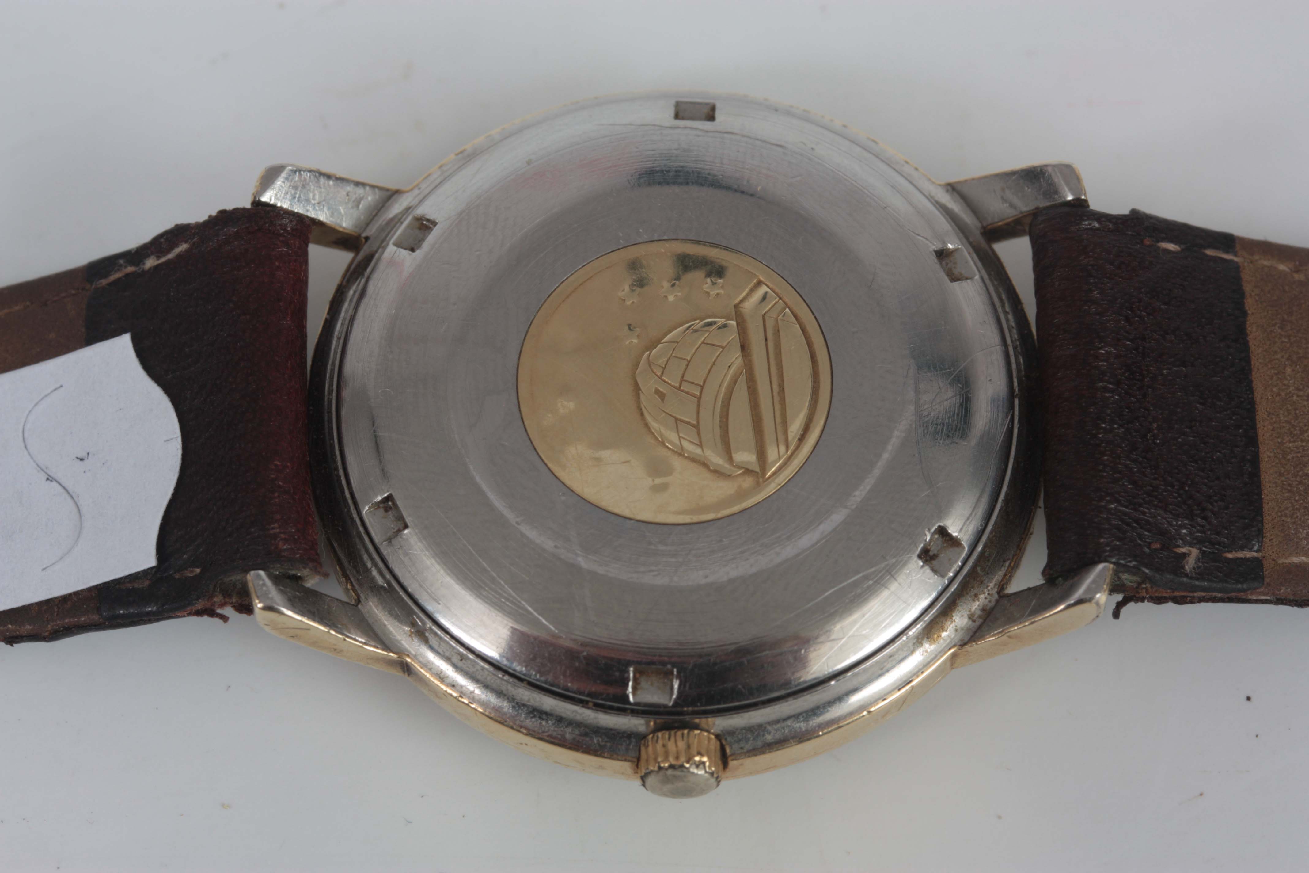 A MID 20TH CENTURY GENTLEMAN'S STEEL AND GOLDPLATED OMEGA CONSTELLATION WRISTWATCH on a brown - Image 3 of 6