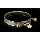 A 19TH CENTURY SILVER AND LEATHER DOG COLLAR having fine scroll engraved decoration with two