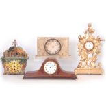 A COLLECTION OF FOUR CLOCKS comprising a gilt metal mantel clock with hunting scene to the case