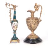 TWO 20TH CENTURY FRENCH EWERS comprising an ormolu cast brass ewer with ceramic base 28cm high and a