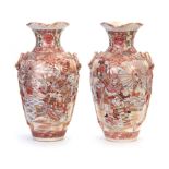 A LARGE PAIR OF MEIJI PERIOD SATSUMA TWO HANDLED VASES of shouldered tapering form with flared