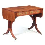 AN EARLY 20TH CENTURY FIGURED WALNUT SOFA TABLE with fold-down sides above two frieze drawers;