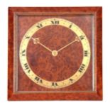 A MID 20TH CENTURY BRASS AND BIRDS-EYE MAPLE STRUT CLOCK with chamfered frame enclosing a square