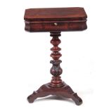 A 19TH CENTURY FRENCH BIEDERMEIER FLAME MAHOGANY WORKBOX with quarter veneered top above a fitted