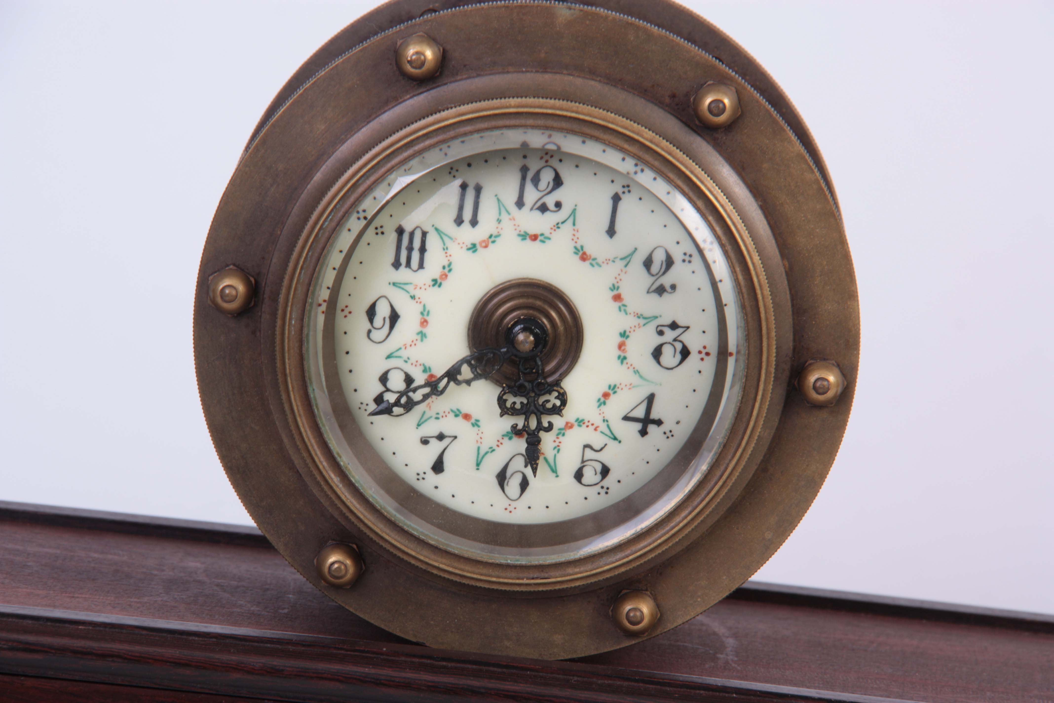 A BRASS CASED INCLINE GRAVITY CLOCK with drum-shaped case enclosing a porcelain dial with Arabic - Image 2 of 2
