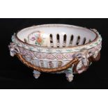 A 19TH CENTURY CONTINENTAL DRESDEN TYPE LARGE TABLE CENTREPIECE/BOWL with pierced body and mask-head