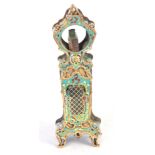 A FRENCH BRASS AND CHAMPLEVE ENAMEL WATCH STAND in the form of a longcase clock 29cm high