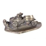 AFTER WILHELM ZWICK. A 20TH CENTURY CAST RESIN COPY OF A VINTAGE RACING CAR DESK STAND with hinged
