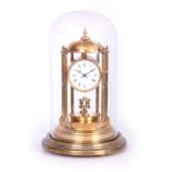 AN EARLY 20TH CENTURY 400 DAY BANDSTAND TORSION CLOCK the brass domed top supported on six reeded