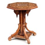 AN ELABORATE 19TH CENTURY EASTERN HARDWOOD AND BONE MARQUETRY INLAID OCTAGONAL CENTRE TABLE with