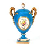A 19TH CENTURY SEVRES STYLE BLUE GROUND URN SHAPED PEDESTAL VASE AND COVER WITH GILT DOUBLE SNAKE