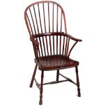 A 19TH CENTURY ASH AND ELM THAMES VALLEY WINDSOR CHAIR with stick back and shaped arms above a