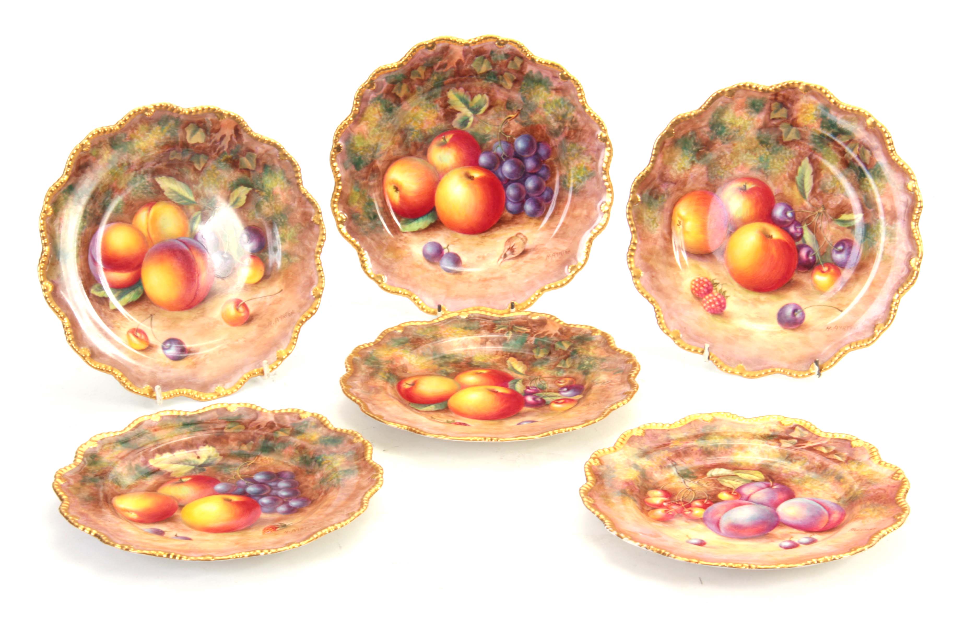 H. AYRTON/FREEMAN. A FINE SET OF SIX ROYAL WORCESTER BLACK MARK FRUIT CABINET PLATES each with