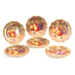 H. AYRTON/FREEMAN. A FINE SET OF SIX ROYAL WORCESTER BLACK MARK FRUIT CABINET PLATES each with