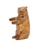 A 19TH CENTURY GILT BRONZE VESTA MODELLED A BEAR having a hinged head with glass eyes 6cm high