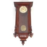 A LATE 19TH CENTURY GERMAN DOUBLE WEIGHT DRIVEN VIENNA STYLE WALL CLOCK the walnut case with