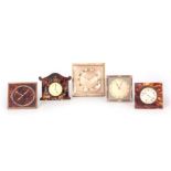 A COLLECTION OF FIVE STRUT CLOCKS of various design with spring driven movements (5)