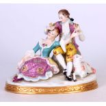 A MEISSEN STYLE CONTINENTAL FIGURE GROUP OF LOVERS seated by a sheep on an oval gilt edged stump