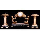 AN ART DECO FIGURAL CLOCK GARNITURE the gilt metal case raised on a marble plinth having seated