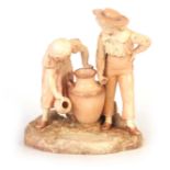 A ROYAL WORCESTER BLUSHED IVORY FIGURE GROUP AFTER HADLEY modelled as a boy and girl with pitchers