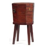 A GEORGE III OCTAGONAL MAHOGANY WINE COOLER with twin brass handles, lead lined interior and