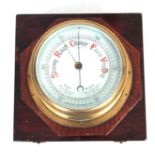 A LATE 19TH CENTURY BRASS CASED SHIPS ANEROID BAROMETER IN WOOD CASE the drum shaped case