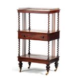 AN EARLY VICTORIAN ROSEWOOD THREE TIER WHATNOT WITH CENTRE DRAWER the three quarter brass gallery