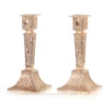 A PAIR OF NEO-CLASSICAL DESIGN FOREIGN SILVER GILT CANDLESTICKS bearing London import marks for 1891