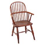 A 19TH CENTURY FRUITWOOD STICK BACK WINDSOR CHAIR with elm seat; standing on turned legs with H