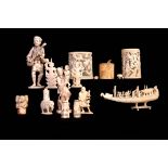 A COLLECTION OF 19TH CENTURY IVORY CARVINGS to include two pierced tusk vases, okimonos and netsukes