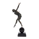 MARCEL ANDRE BOURAINE (1886 - 1948) AN EARLY 20TH CENTURY ART DECO BRONZE AND IVORY FIGURE 'THE