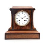 A LATE 19TH CENTURY WALNUT AND EBONISED MANTEL CLOCK the moulded case enclosing a 4" enamel dial