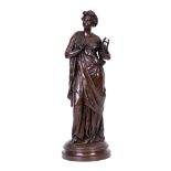 A REPRODUCTION FIGURAL FILLED BRONZE SCULPTURE depicting a classical lady playing the harp -