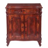 A 19TH CENTURY FRENCH BIEDERMEIER STYLE FLAMED MAHOGANY SERPENTINE SIDE CABINET with frieze drawer